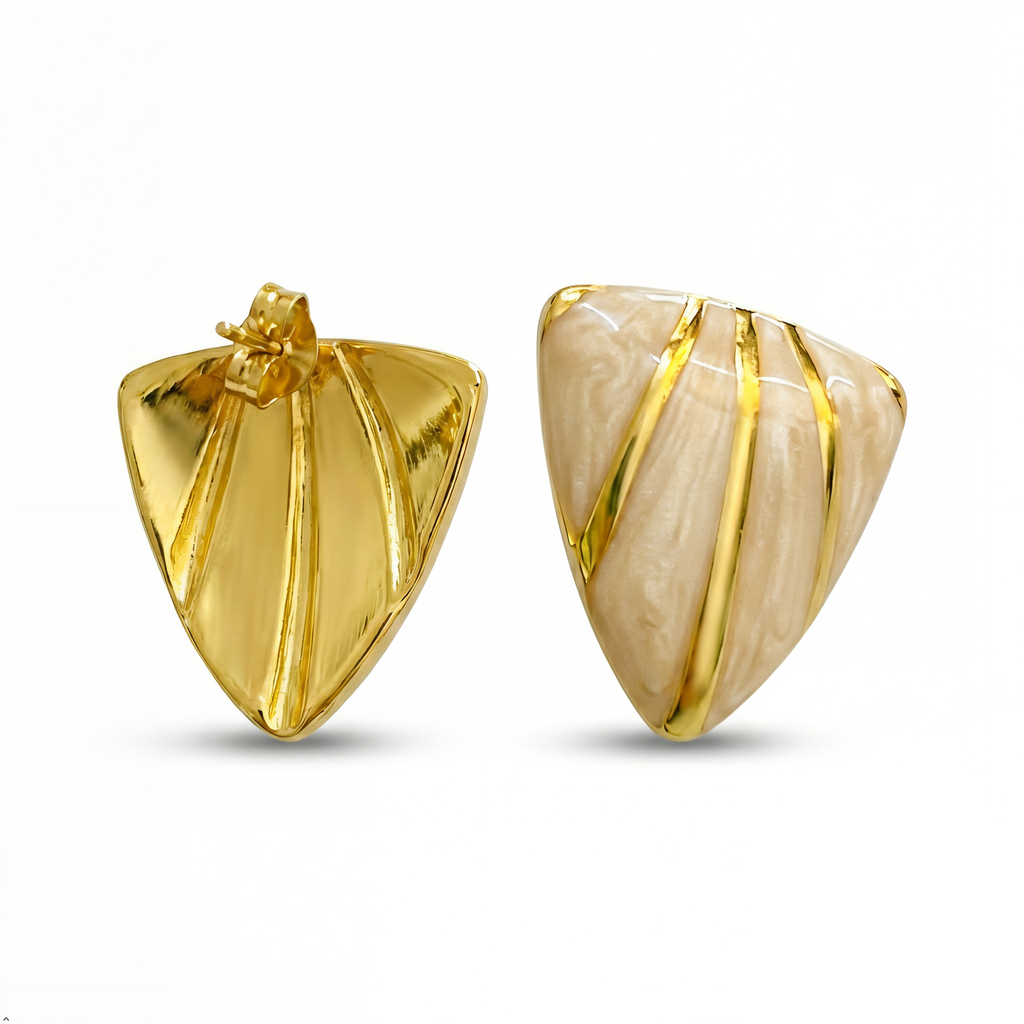 Elegant sculpted shell studs designed to elevate everyday looks—from brunch dates to festive dinners.